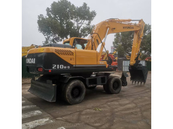 Колёсный экскаватор HYUNDAI R210